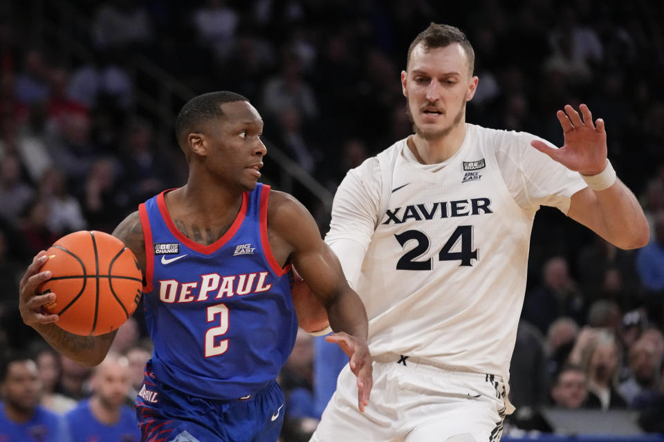 DePaul's Umoja Gibson (2) shoots against Xavier's Jack Nunge (24) in the second half of an NCAA college basketball game during the quarterfinals of the Big East conference tournament, Thursday, March 9, 2023, in New York. (AP Photo/John Minchillo)
