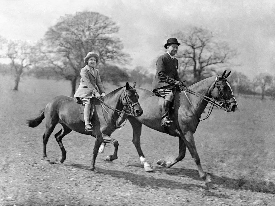 A young Queen Elizabeth rides a horse in 1935.