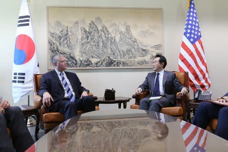 FILE PHOTO: U.S. special representative for North Korea Stephen Biegun talks to South Korea's Special Representative for Korean Peninsula Peace and Security Affairs Lee Do-hoon during a meeting to discuss North Korea nuclear issues at the Foreign Ministry in Seoul, South Korea, October 29, 2018. Ahn Young-joon/Pool via REUTERS