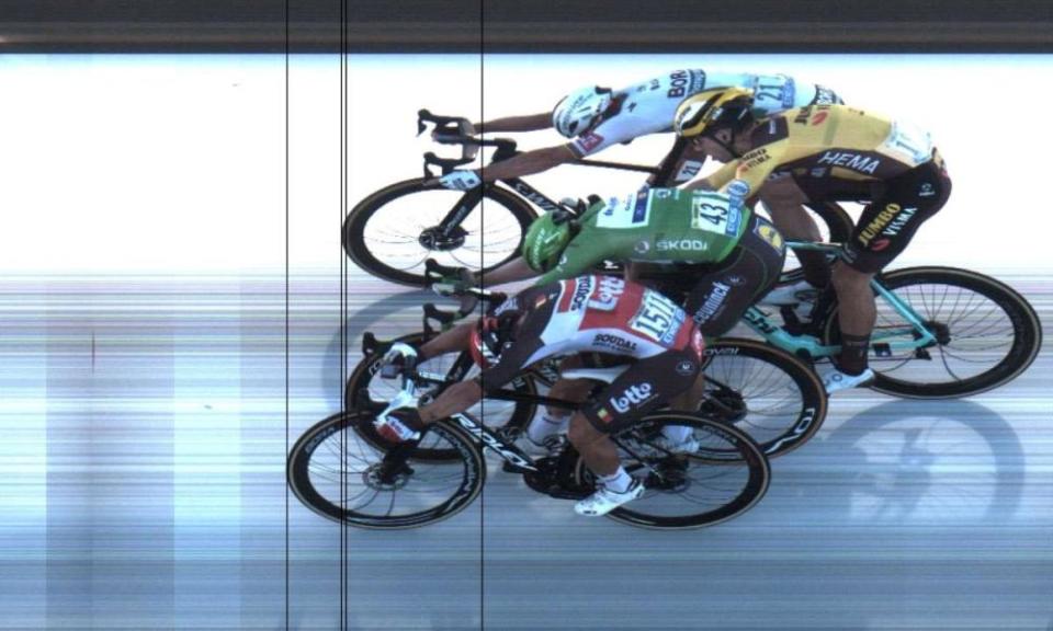 Lotto Soudal rider Caleb Ewan wins the stage ahead of BORA-Hansgrohe rider Peter Sagan and Deceuninck-Quick Step rider Sam Bennett wearing the green jersey, and Team Jumbo-Visma rider Wout Van Aert in this photofinish handout of the finish of Stage 11 - Chatelaillon-Plage to Poitiers.