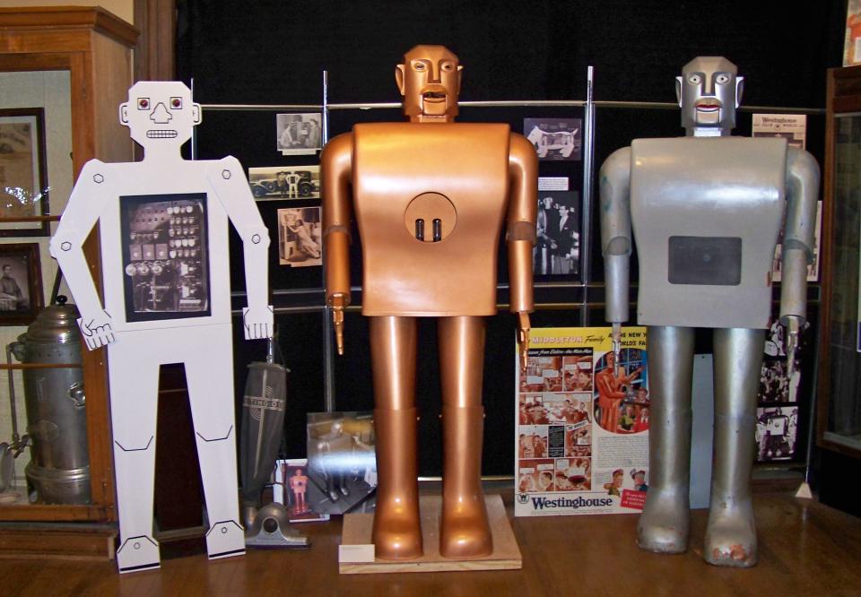 From left, Herbert Televox, a replica of Elektro and Elektro himself standing inside the Mansfield Memorial Museum.