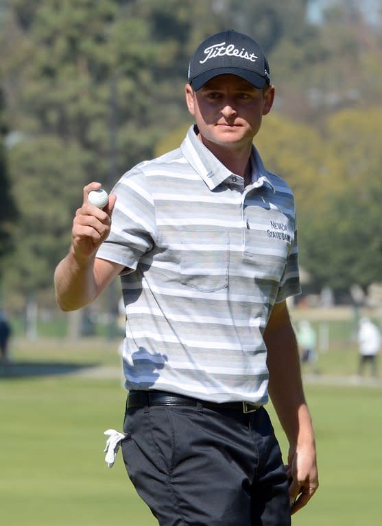 John Merrick celebrates his birdie on the 10th hole during the final round of the Northern Trust Open at the Riviera Country Club on February 17, 2013. Merrick was one of three players who started the day three shots off the lead held by Bill Haas and he had four birdies and two bogeys in a final-round 69 for 11-under 273