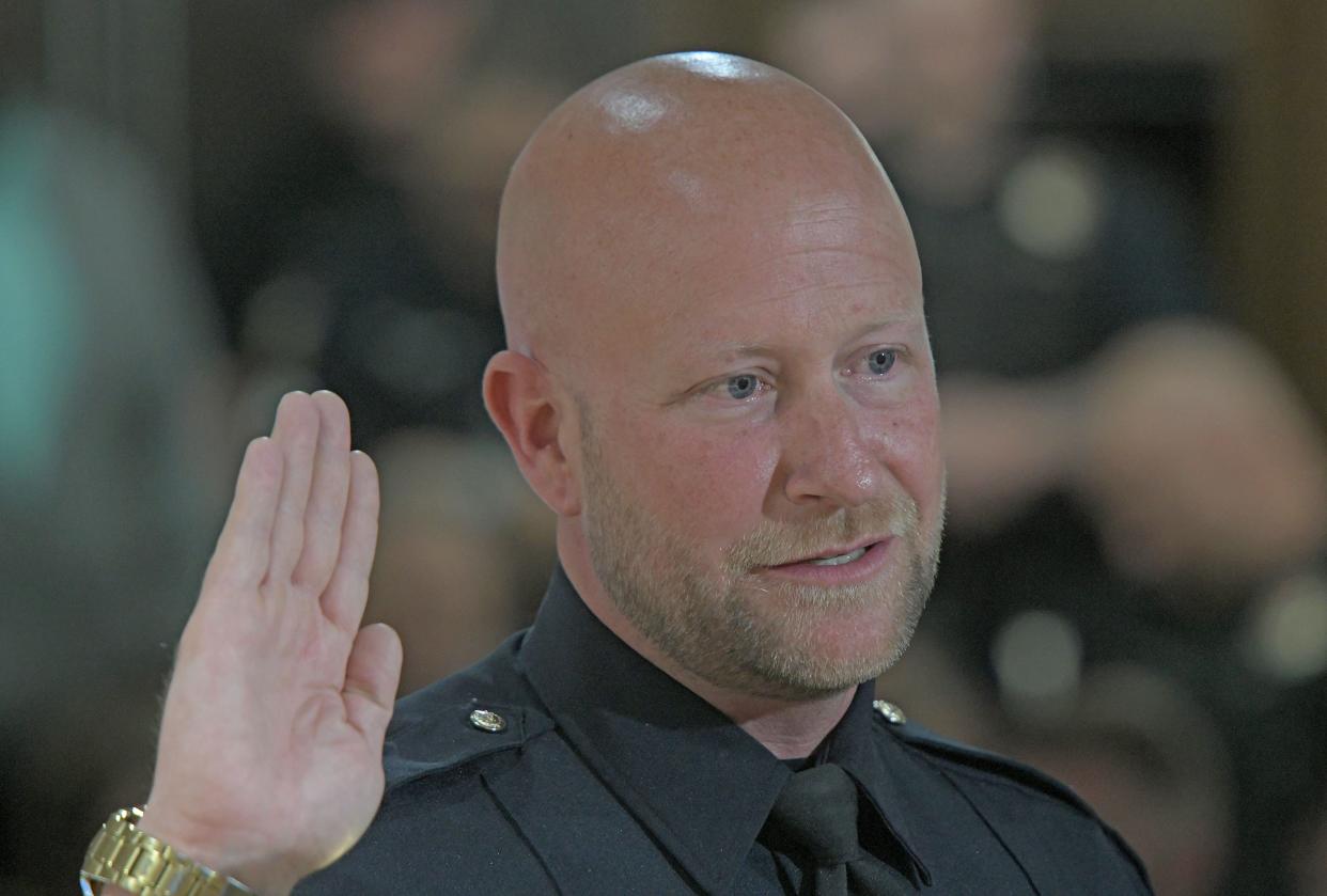 Mansfield police Lt. Michael Napier is sworn-in Thursday afternoon as he was was promoted to assistant chief.