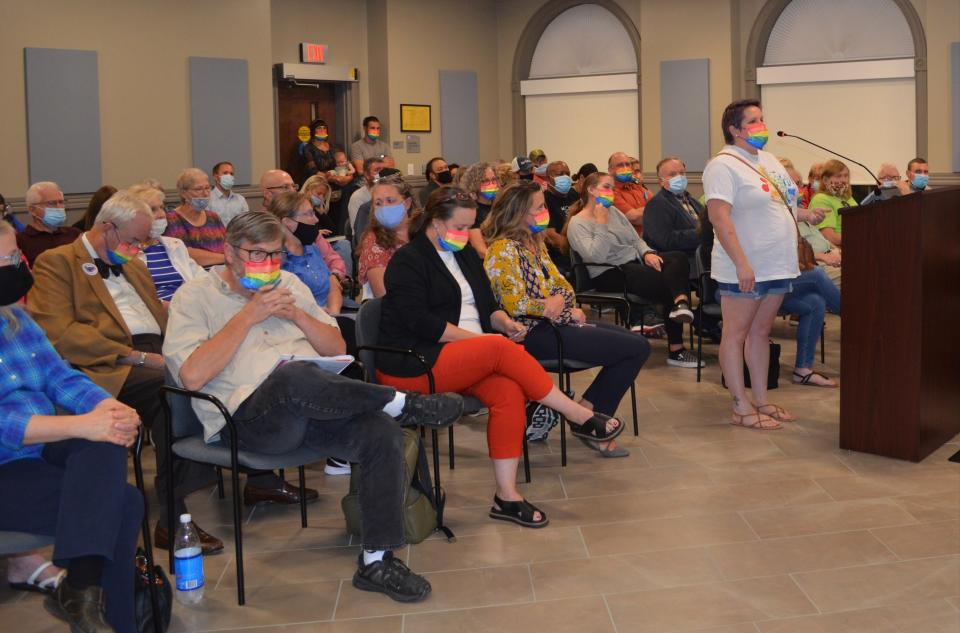 Supporters of Chambersburg's non-discrimination ordinance wore rainbow-colored masks to the town council meeting in 2021, when it was approved.