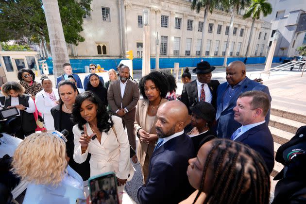 Co-founders and CEOs of The Fearless Fund Arian Simone, center left, and Ayana Parsons, center right, speak to journalists outside the James Lawrence King Federal Building in Miami as they leave with their legal team following a hearing on Wednesday, Jan. 31, 2024.