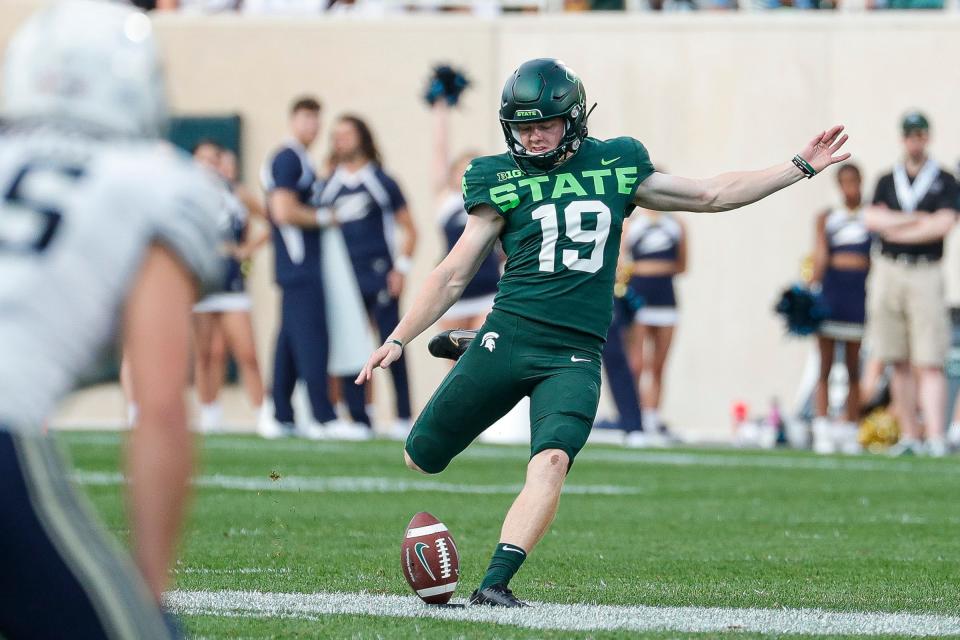 Michigan State place kicker Jack Stone (19) kicks off against Akron during the second half at Spartan Stadium in East Lansing on Saturday, Sept. 10, 2022.