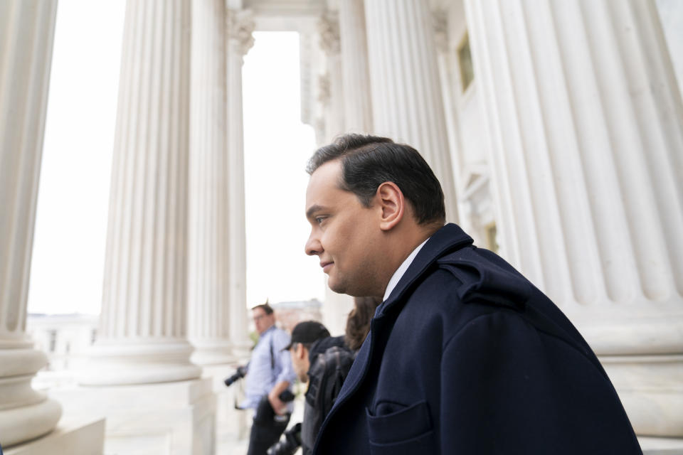 FILE - Rep. George Santos, R-N.Y., leaves the Capitol after being expelled from the House of Representatives, Friday, Dec. 1, 2023, in Washington. Santos is out of Congress, but his name is certain to pop up in key congressional races throughout New York next year, with Democrats targeting five seats held by first-term Republicans and looking to associate those incumbents with Santos as often as they can. (AP Photo/Stephanie Scarbrough, File)