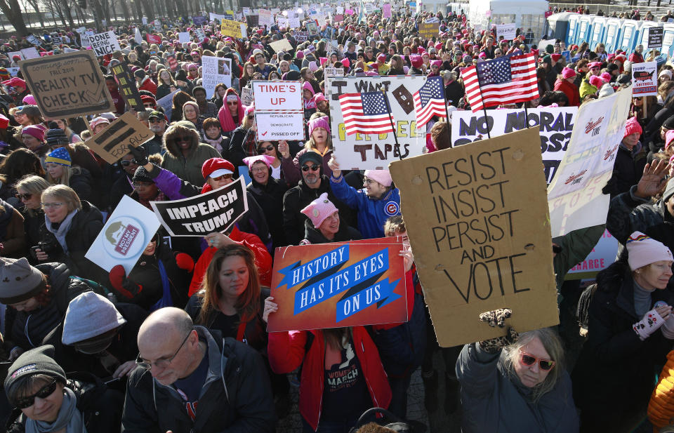 <p>Demostrators attend the Second Annual Womens March in Chicago, Ill., on Jan. 20, 2018. (Photo: Jim Young/AFP/Getty Images) </p>