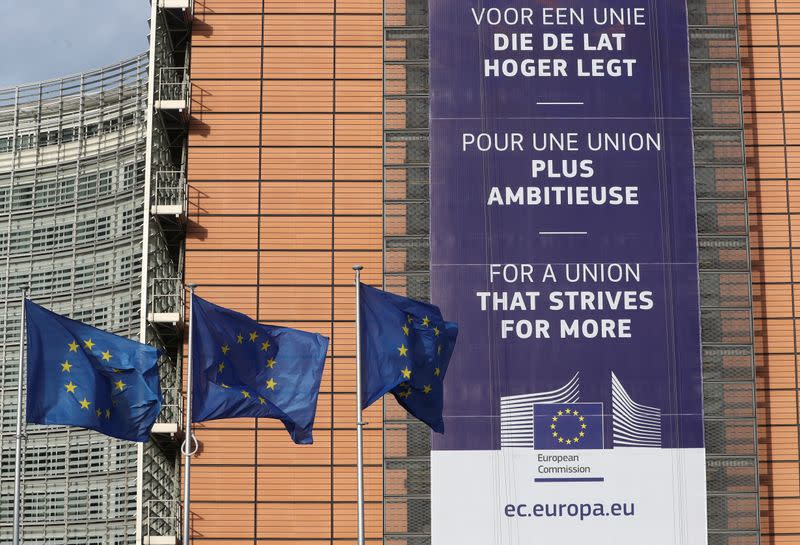 European Union flags fly outside the European Commission headquarters in Brussels