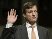 Credit Suisse CEO Brady Dougan is sworn in prior to testifying before the Senate Homeland and Governmental Affairs Investigations Subcommittee on Capitol Hill in Washington February 26, 2014. REUTERS/Gary Cameron