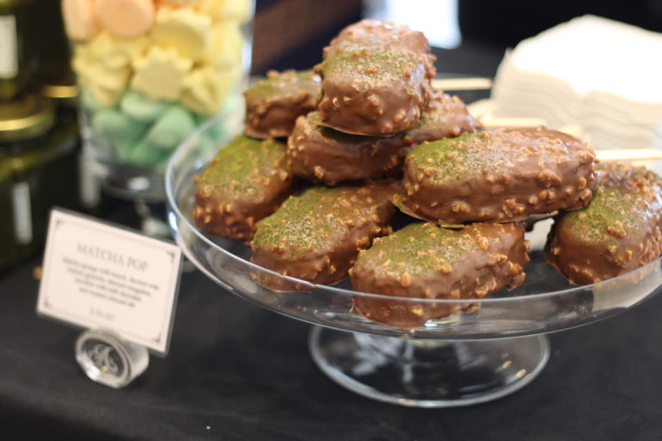 <p>Don’t be fooled by the name and appearance, this chocolate green tea dessert is not ice-cream, but rather it’s a green tea sponge cake coated with nuts and chocolate. The inside includes matcha ganache and almond nougatine. </p>