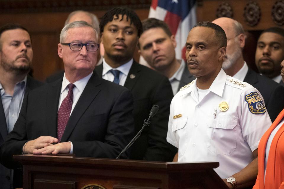 Philadelphia Police Commissioner Richard Ross, right, speaks during a news conference as Mayor Jim Kenney looks on at City Hall in Philadelphia on Aug. 15, 2019.