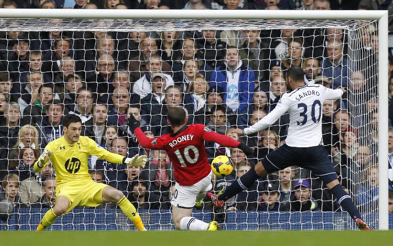 Wayne Rooney scores a goal for Manchester United against Tottenham Hotspur at White Hart Lane in London on December 1, 2013