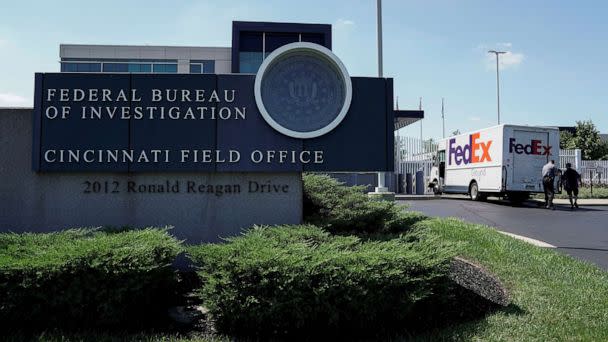 PHOTO: A FedEx truck is inspected outside of the front gate of the FBI's Field Office, after police closed off Interstate 71 North after reports of a suspect attempting to attack the FBI building, in Cincinnati, Aug. 11, 2022.  (Jeffrey Dean/Reuters)