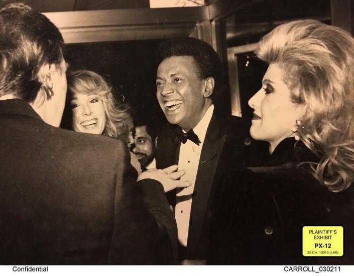 Donald Trump met E Jean Carroll in 1987 when he was married to Ivanka Trump, and she wa with her then-husband John Johnson (Supplied)