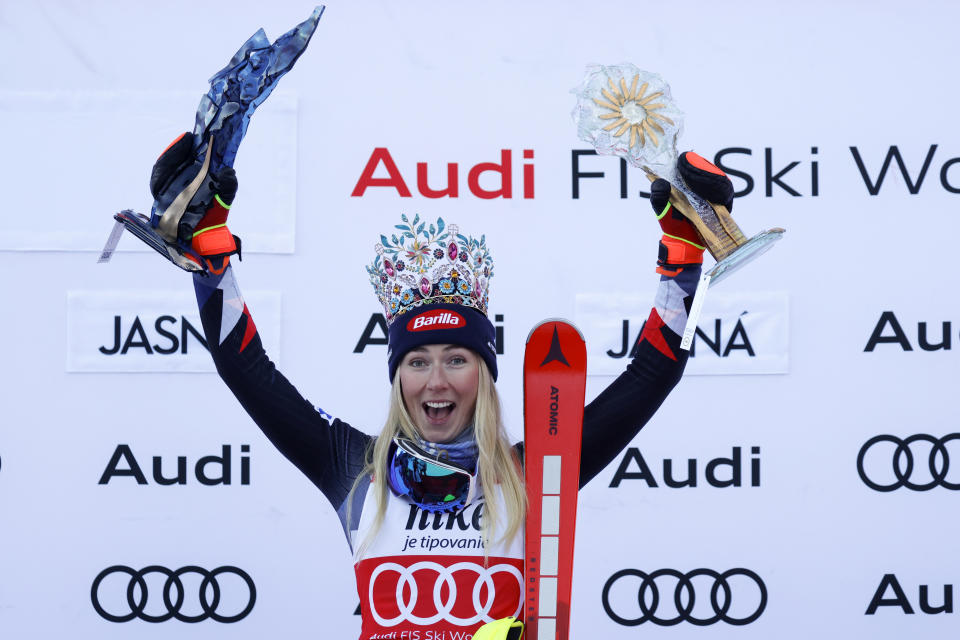 United States' Mikaela Shiffrin celebrates on the podium after winning an alpine ski, women's World Cup slalom race, in Jasna, Slovakia, Sunday, Jan. 21, 2024. (AP Photo/Giovanni Maria Pizzato)