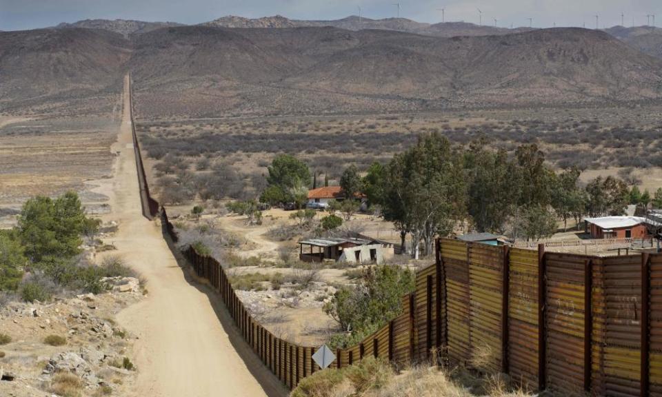 The US-Mexico border fence cuts through Jacumba, California. Two-thirds of those polled do not see the border wall as an important policy.