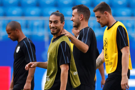 Soccer Football - World Cup - Uruguay Training - Samara Arena, Samara, Russia - June 24, 2018 Uruguay's Martin Caceres and team mates during training REUTERS/David Gray