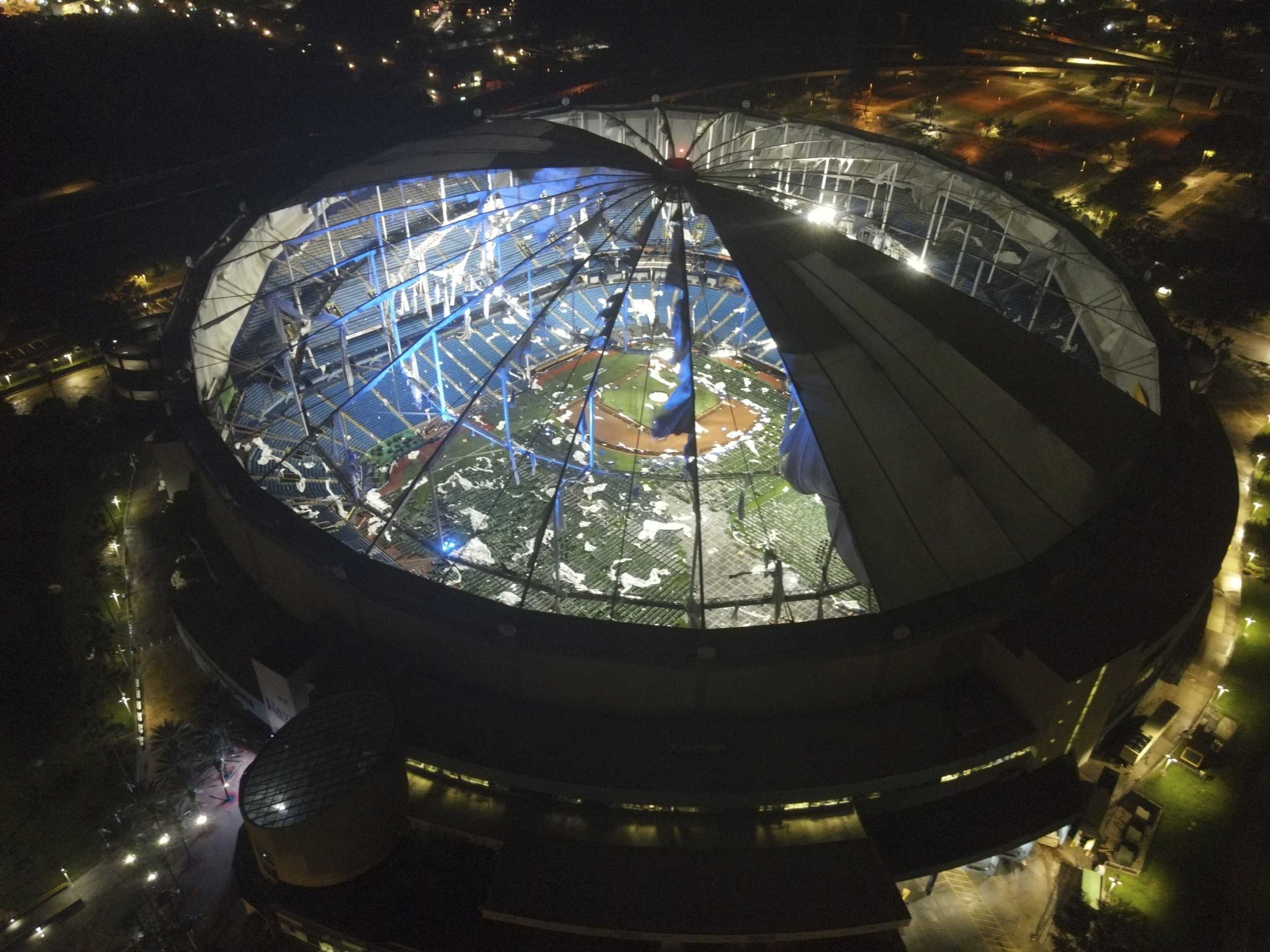 An aerial view of the shredded roof of Tropicana Field in downtown St. Petersburg, Florida, following Hurricane Milton early Thursday. 