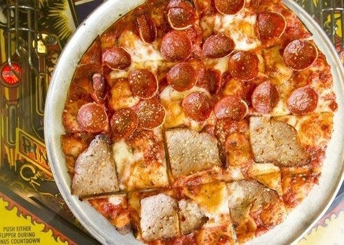 A half-pepperoni, half-sausage pie at Rubino's Pizza [Rob Hardin/Alive]