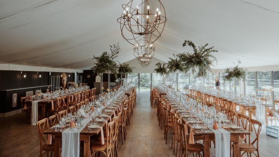 Wedding tables inside a marquee