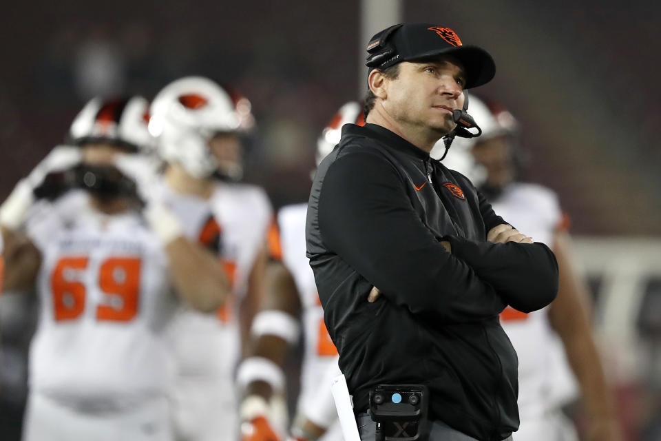FILE - In this Nov. 10, 2018, file photo, Oregon State head coach Jonathan Smith looks at the scoreboard during a timeout against Stanford in the second half during an NCAA college football game in Stanford, Calif. The Beavers open the season at home against Washington State on Nov. 7. (AP Photo/Tony Avelar, File)