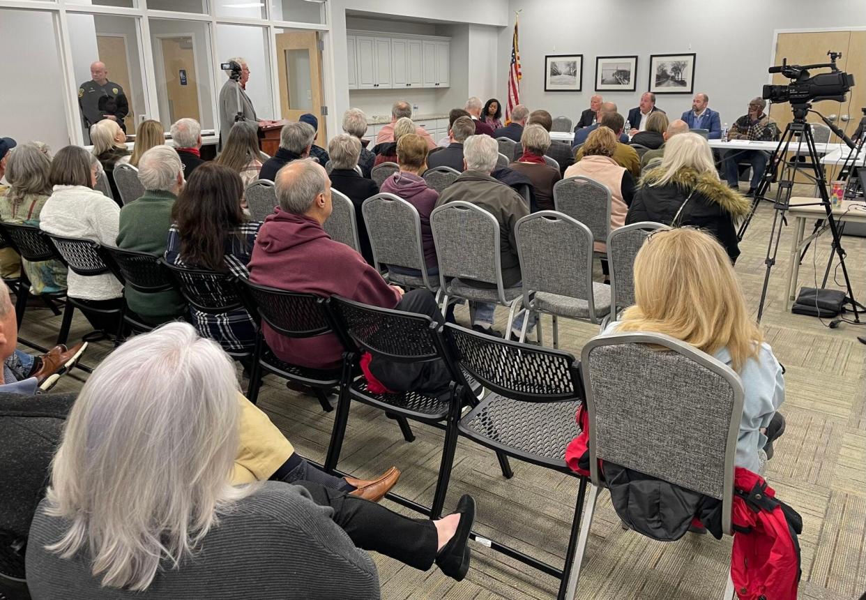 New Bern residents speak out about the proposed sell of the downtown Talbots Lot during a special called meeting of the New Bern Board of Aldermen Wednesday night.