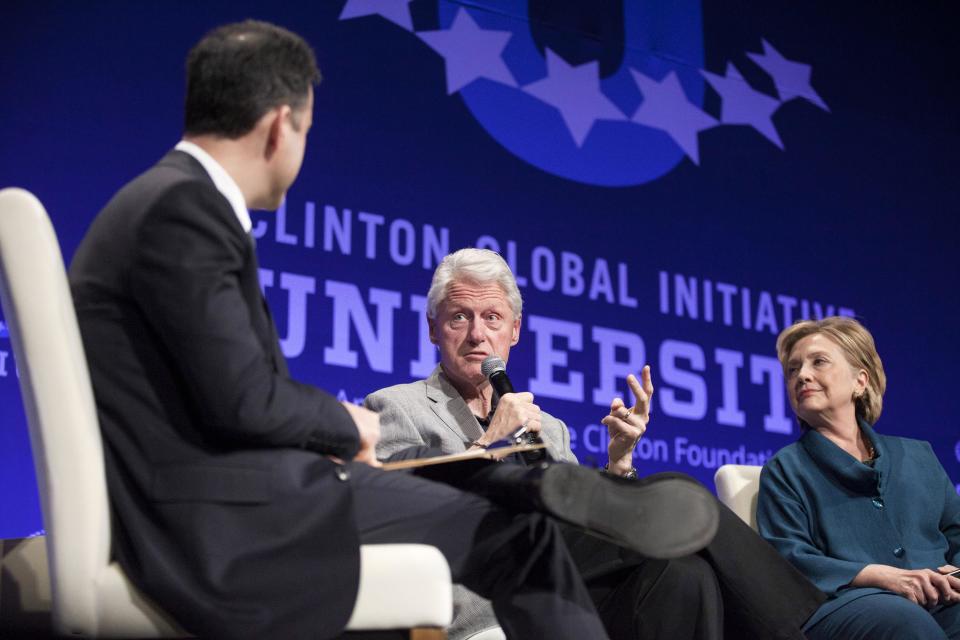 From L-R: Comedian Jimmy Kimmel, former U.S. President Bill Clinton and former Secretary of State Hillary Clinton discuss how technology has enabled change within the world during the closing plenary session on the second day of the 2014 Meeting of Clinton Global Initiative University at Arizona State University in Tempe, Arizona March 22, 2014. REUTERS/Samantha Sais (UNITED STATES - Tags: POLITICS ENTERTAINMENT EDUCATION)