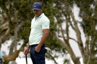 Brooks Koepka reacts after missing his putt on the sixth green during the third round of the U.S. Open Golf Championship, Saturday, June 19, 2021, at Torrey Pines Golf Course in San Diego. (AP Photo/Gregory Bull)