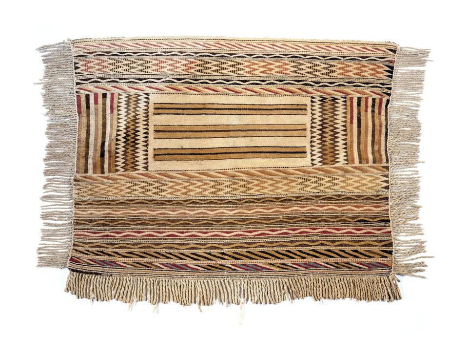 A Coast Salish classic-style blanket, which has woolly dog hair in the warp fibers that were stretched across the loom. Accessioned 1838-1842. USNM E2124, Smithsonian National Museum of Natural History