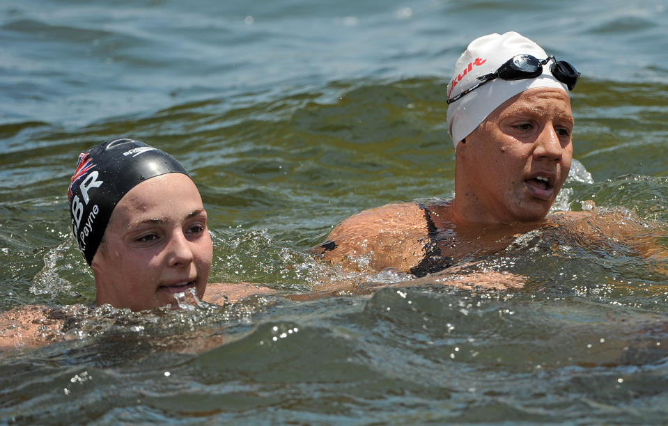 Gold medal winner Britain's Keri-Anne Payne (L) and bronze medalist Greece's Marianna Lymperta (R) look on after finishing the women's 10km open water swimming event of the FINA World Championships in Shanghai on July 19, 2011. Payne, who took silver at the 2008 Beijing Games, swam the women's 10km open water in 2hr 1min 58.1secs, ramping up hopes for London 2012.  AFP PHOTO / PHILIPPE LOPEZ (Photo credit should read PHILIPPE LOPEZ/AFP/Getty Images)