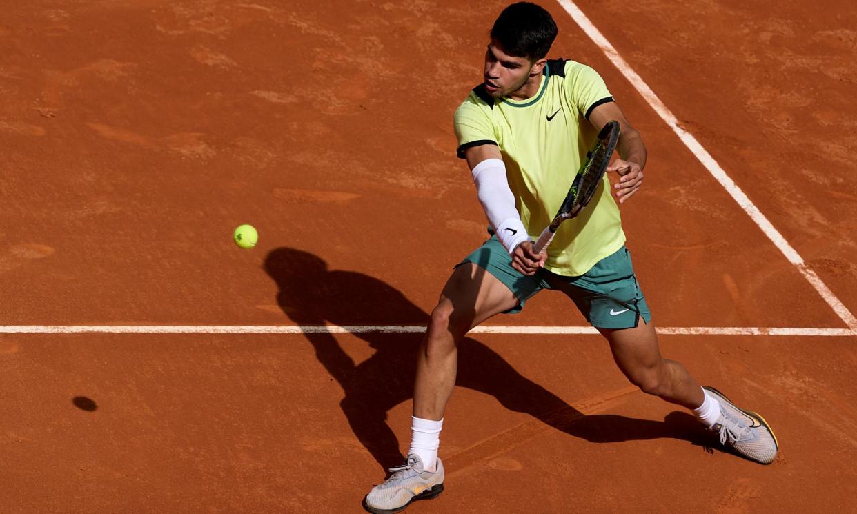 <span>Carlos Alcaraz, with his protective sleeve, in action against Thiago Seyboth Wild.</span><span>Photograph: Quality Sport Images/Getty Images</span>
