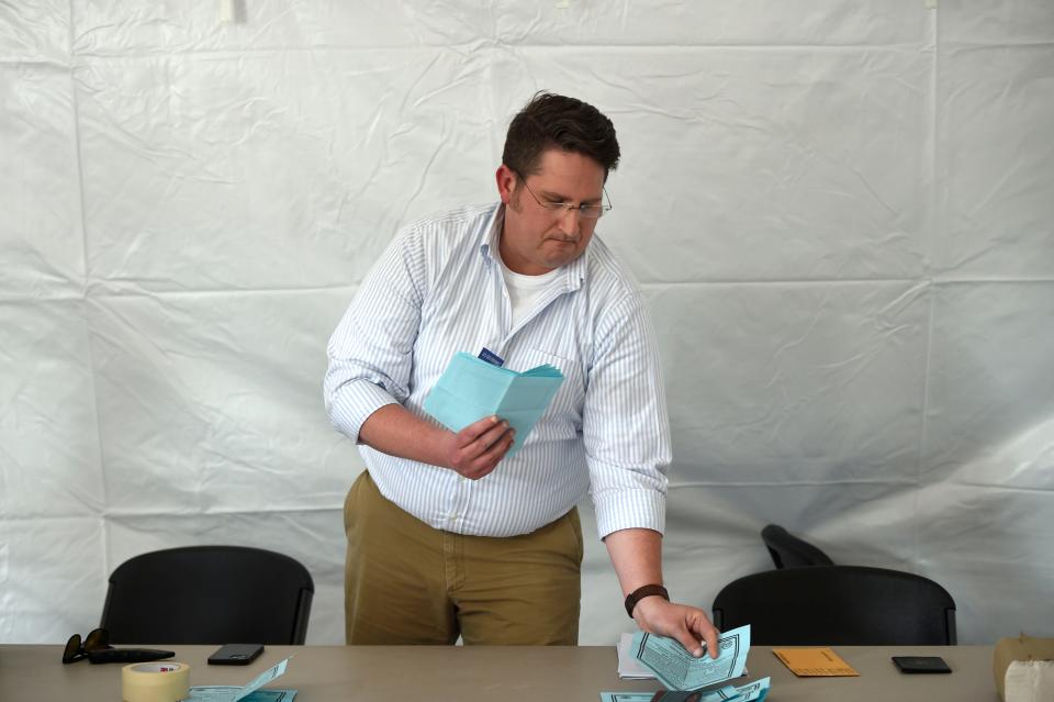 Field Examiner Alexander Hajduk counts the union votes for Augusta's Starbucks off Robert C Daniel Jr. Parkway on Thursday, April 28, 2022.