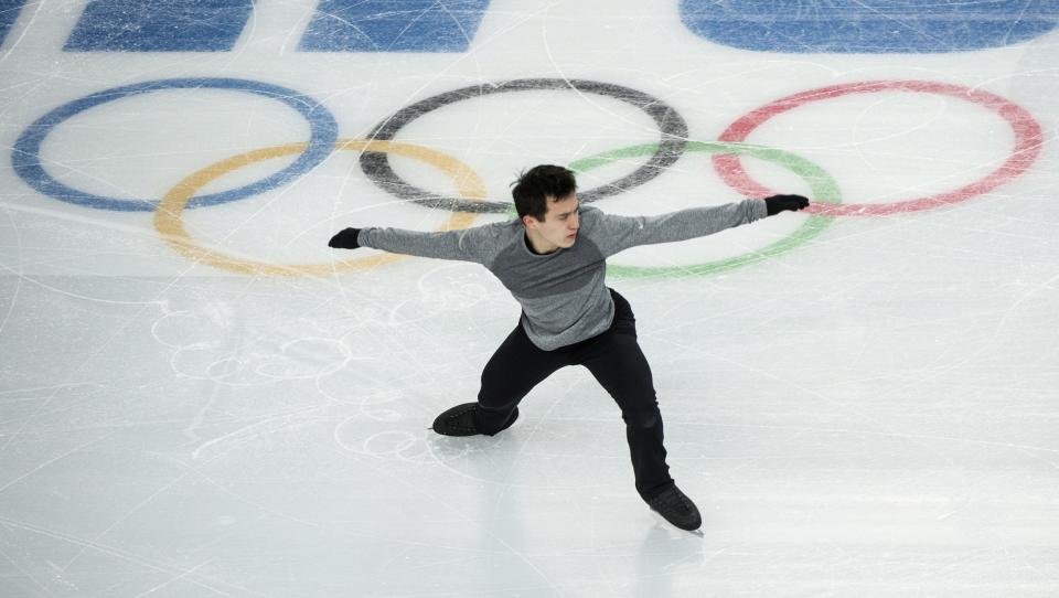 Canada's Patrick Chan goes through his routine during a figure skating practice at the 2014 Winter Olympics Wednesday, Feb. 5, 2014 in Sochi, Russia. (AP Photo/The Canadian Press, Paul Chiasson)