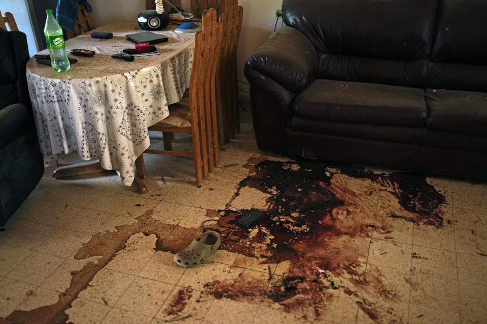 Blood is splattered in a house at Kibbutz Kissufim in southern Israel, Saturday, Oct. 21, 2023. The Kibbutz was overrun by Hamas militants from the nearby Gaza Strip on Oct. 7, when they killed and captured many Israelis. (AP Photo/Francisco Seco)