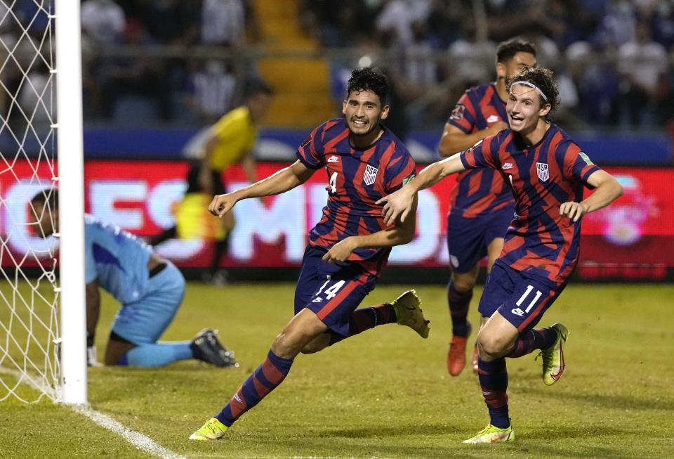 United States' Ricardo Pepi, (14) celebrates scoring his side's second goal against Honduras during a qualifying soccer match for the FIFA World Cup Qatar 2022, in San Pedro Sula, Honduras, Wednesday, Sept. 8, 2021. (AP Photo/Moises Castillo)