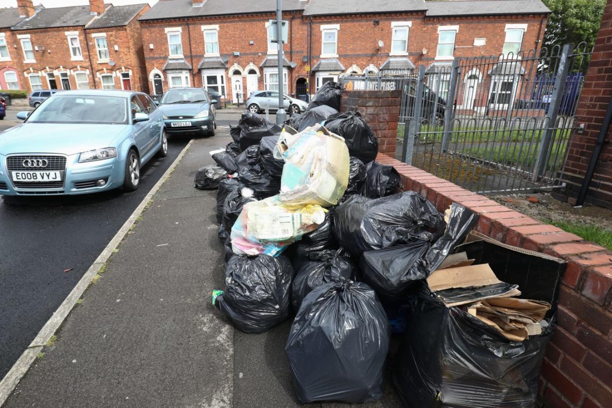 Rubbish bags piled high in Tarry Road, Birmingham (Aaron Chown/PA)