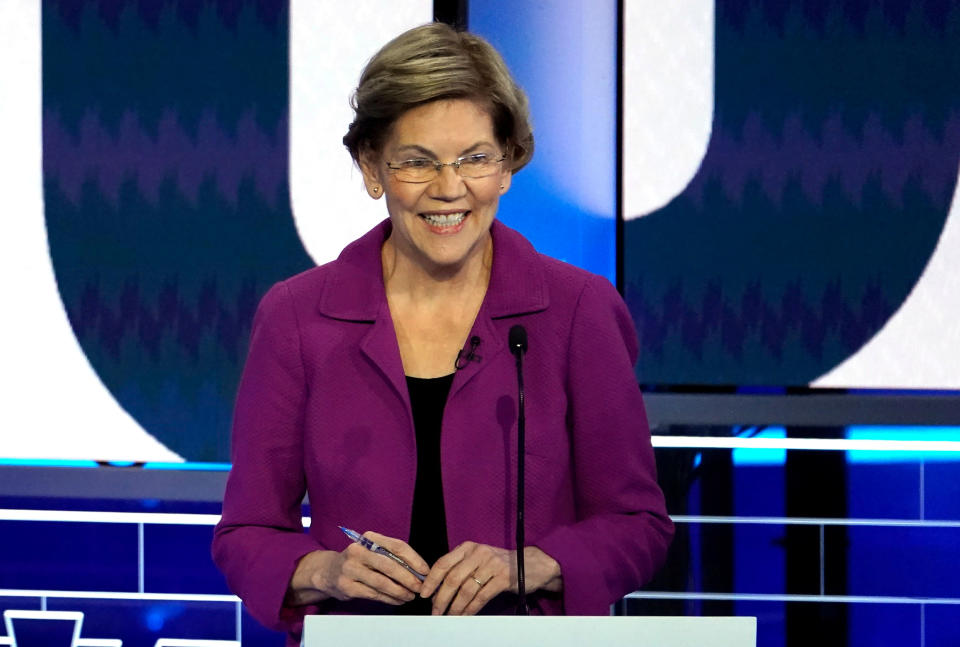 Senator Elizabeth Warren smiles as she speaks at the ninth Democratic 2020 U.S. Presidential candidates debate at the Paris Theater in Las Vegas, Nevada, U.S., February 19, 2020. REUTERS/Mike Blake     TPX IMAGES OF THE DAY