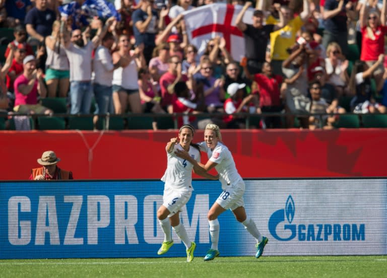 Fara Williams (left) celebrates her goal for England with teammate Toni Duggan in the Women's World Cup semi-final against Japan in Edmonton, Canada on July 1, 2015