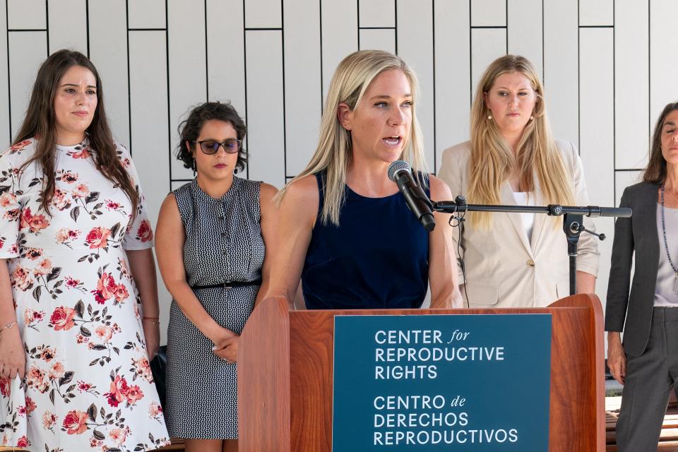 Amanda Zurawski (C) speaks during a press conference outside the Travis County Courthouse on July 19, 2023 in Austin, Texas.