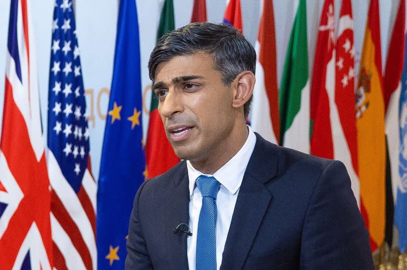 Britain's Prime Minister Rishi Sunak speaks to media as he prepares to leave the G20 Summit in Sept. 2023 in New Delhi, India. Sunak on Wednesday called for elections to be held on July 4. File Photo By Simon Walker/No. 10 Downing Street/UPI