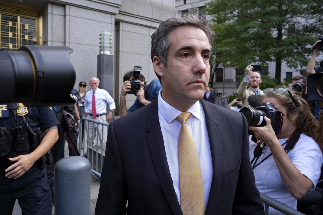 Michael Cohen, former personal lawyer to Donald Trump, leaves federal court after reaching a plea agreement in New York: AP