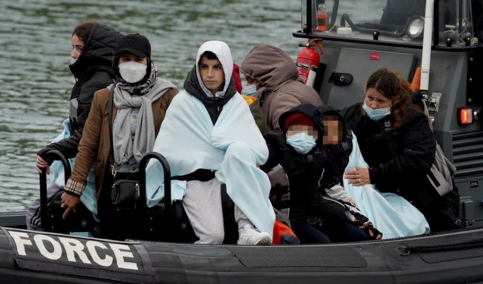 Children amongst group of people thought to be migrants are brought in to Dover, Kent, onboard a Border Force vessel, following a small boat incident in the Channel (PA) (PA Wire)