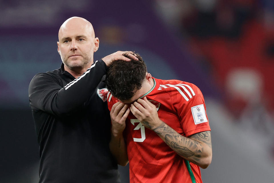 Seen here, Wales coach Rob Page consoles an emotional Neco Williams after the World Cup draw against the USA.