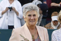 FILE - In this April 7, 2012, file photo, Judy Tegart Dalton, a member of the original nine women who helped start the women's professional tennis tour, are honored at the Family Circle Cup tennis tournament in Charleston, S.C. It’s the 50th anniversary of Billie Jean King and eight other women breaking away from the tennis establishment in 1970 and signing a $1 contract to form the Virginia Slims circuit. That led to the WTA Tour, which offers millions in prize money. (AP Photo/Mic Smith, File)