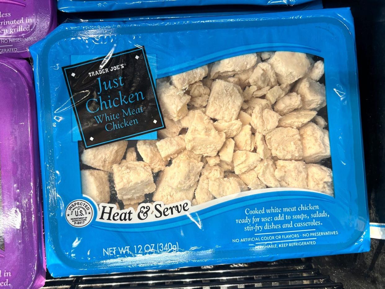 A blue package of Trader Joe's heat-and-serve Just Chicken white-meat chicken.