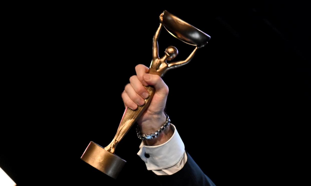 <span>The Booker prize trophy in the hand of last year’s winner, Paul Lynch.</span><span>Photograph: Kate Green/Getty Images</span>