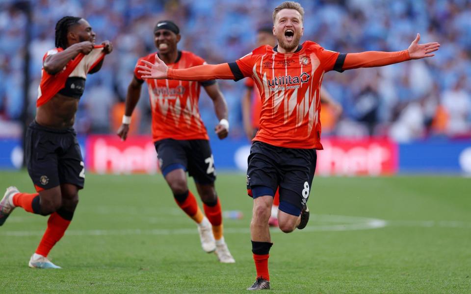Luke Berry of Luton Town celebrates after Fankaty Dabo of Coventry City (not pictured) misses a penalty in the penalty shoot out - Getty Images/Richard Heathcote