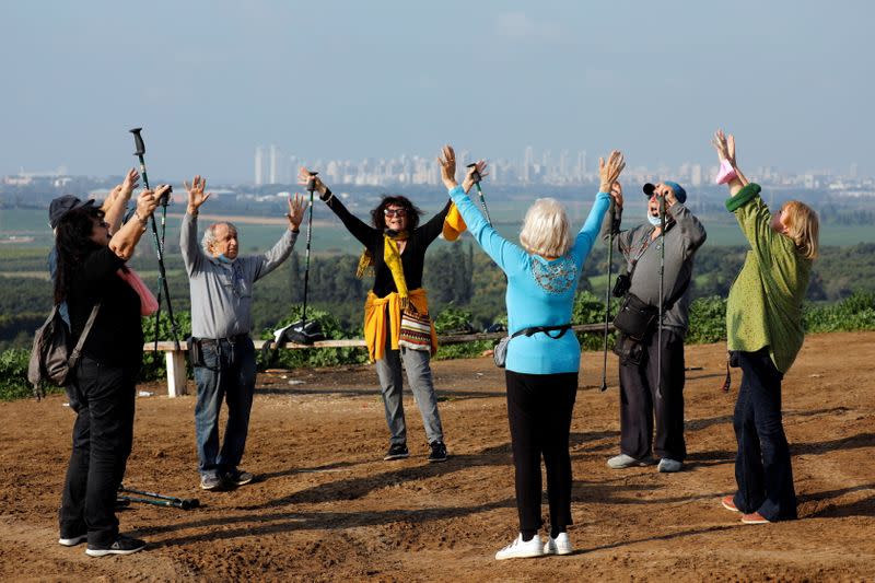 To lift lockdown gloom, Israelis keep calm and carry on screaming