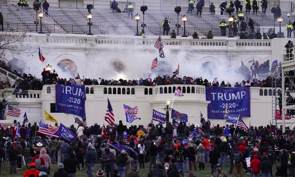 <span>Photograph: John Minchillo/AP</span>